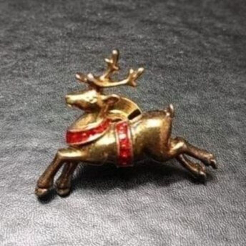 **Last Chance!! Final Sale** Vintage Avon copper tone flying reindeer pin
